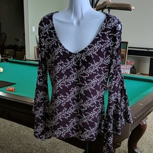 Cold shoulder blouse.